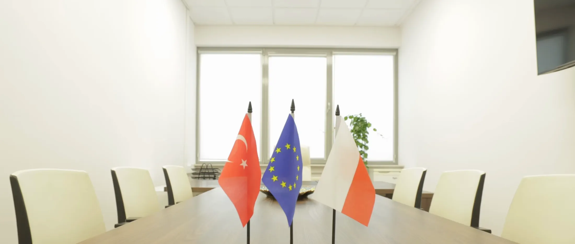 Inside the Meyis office in Warsaw — meeting rooms and corridor